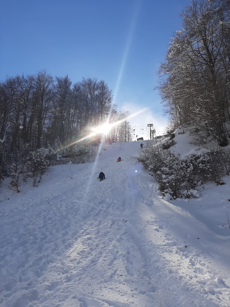 Monte Sirino -Conserva in Italy - a person walking up a snow covered hill.