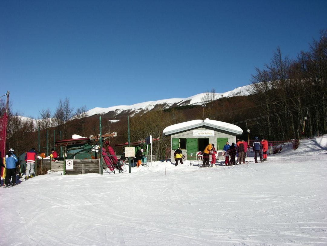 Monte Sirino -Conserva in Italy - a group of people standing in the snow.