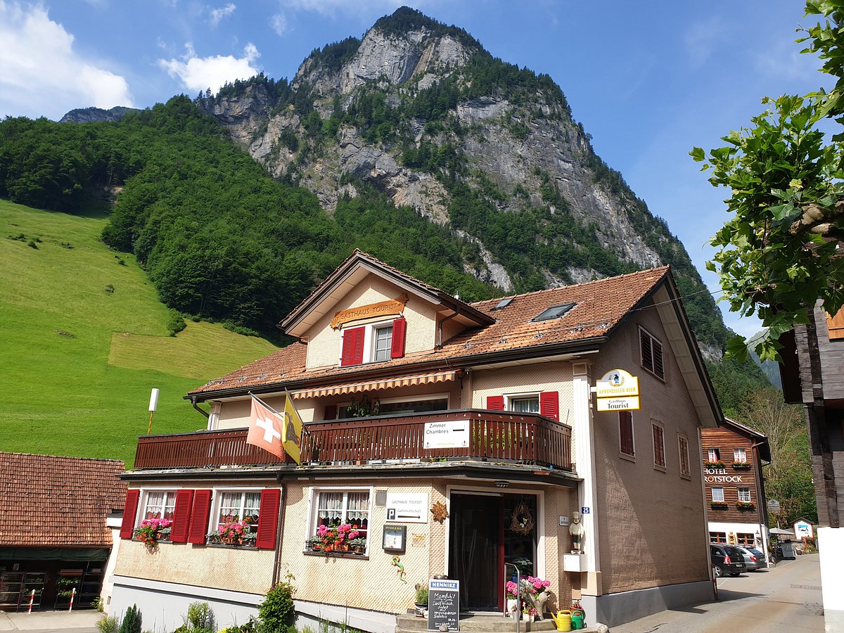 Gitschenen in Switzerland - a small town with a mountain in the background.