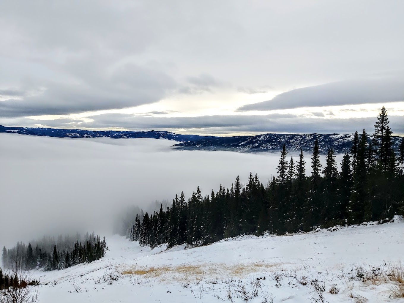 Skagahøgdi in Norway - a view from the top of a snowy mountain.
