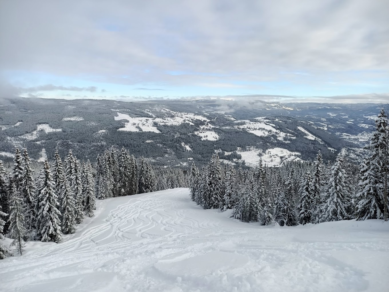 Skagahøgdi in Norway - a view from the top of a snowy mountain.