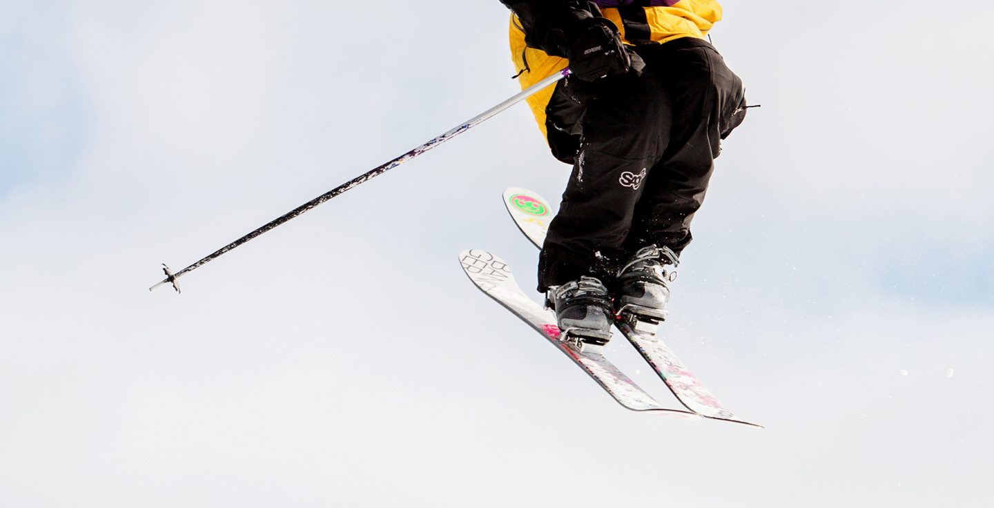 Shanty Creek Summit Mountain in USA - a person jumping in the air on skis.