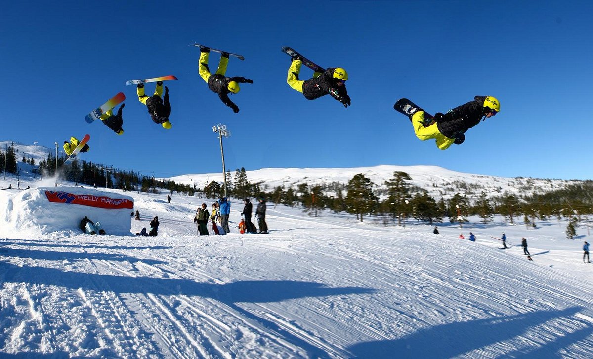 Grong in Norway - a group of snowboarders doing tricks in the air.