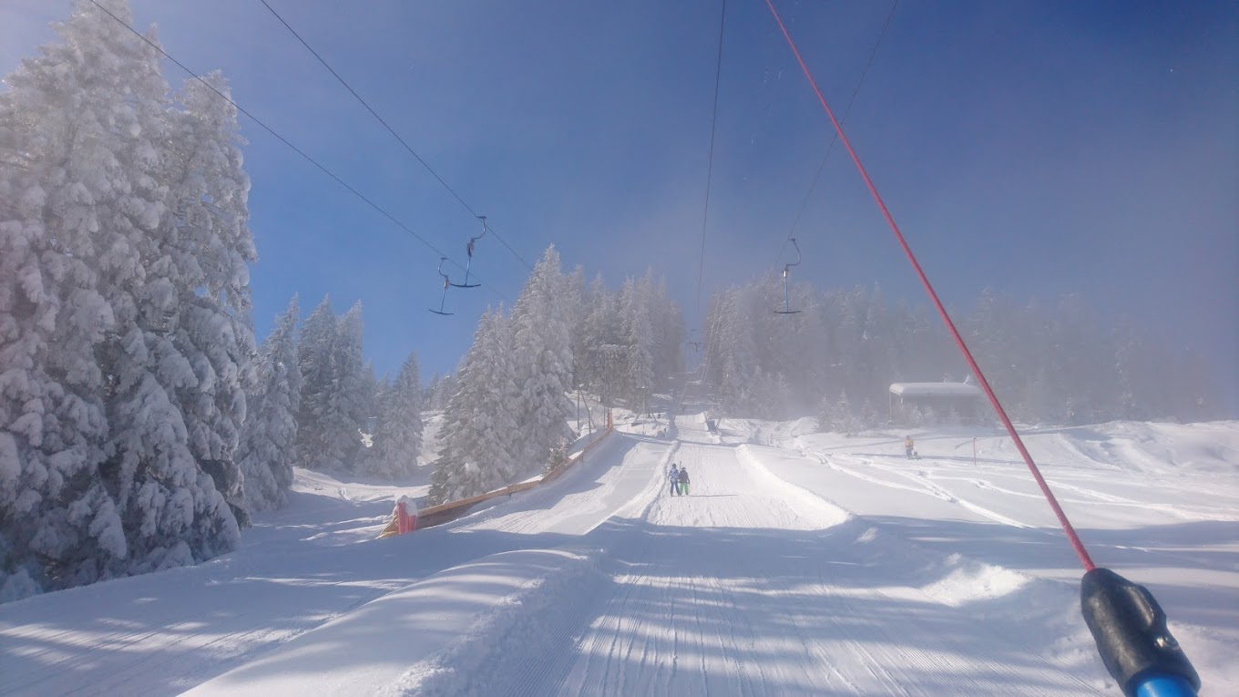 Selital in Switzerland - a person riding a ski board on a snowy slope.