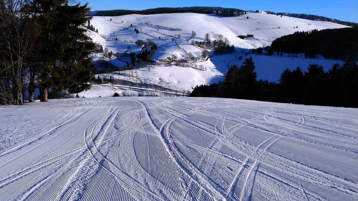 Münstertal-Wieden in Germany - a ski slope with tracks in the snow.