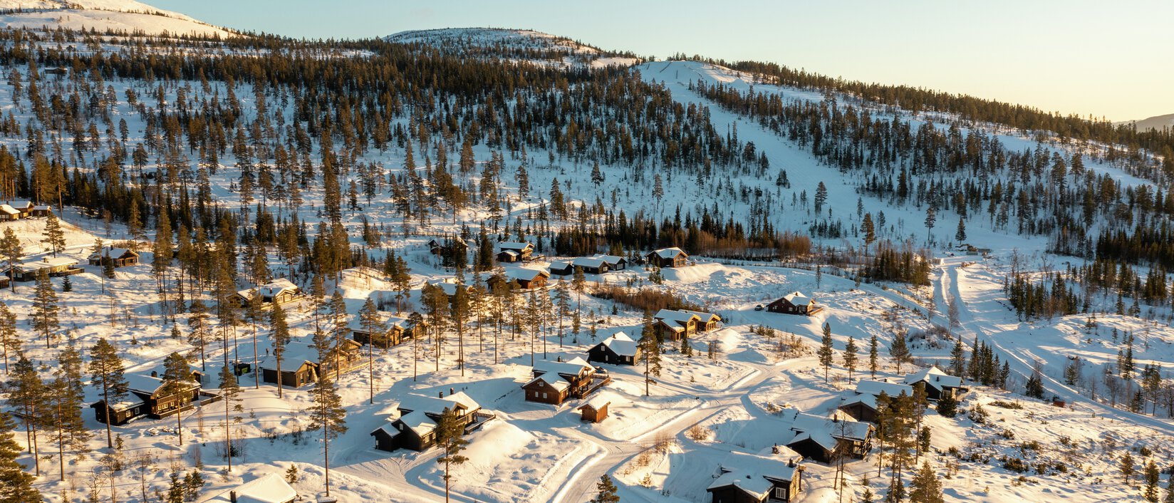 Fulufjellet in Norway: an aerial view of a ski resort in the mountains.