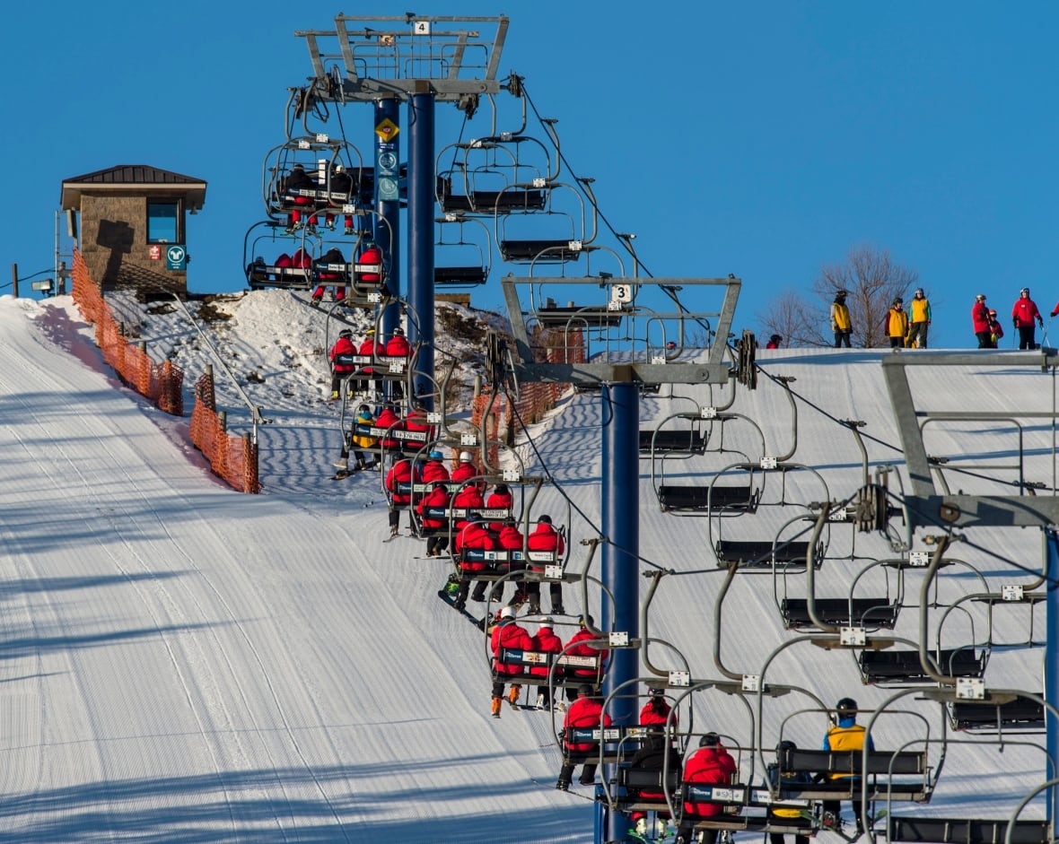 Chicopee in Canada - a ski lift going up the side of a mountain.