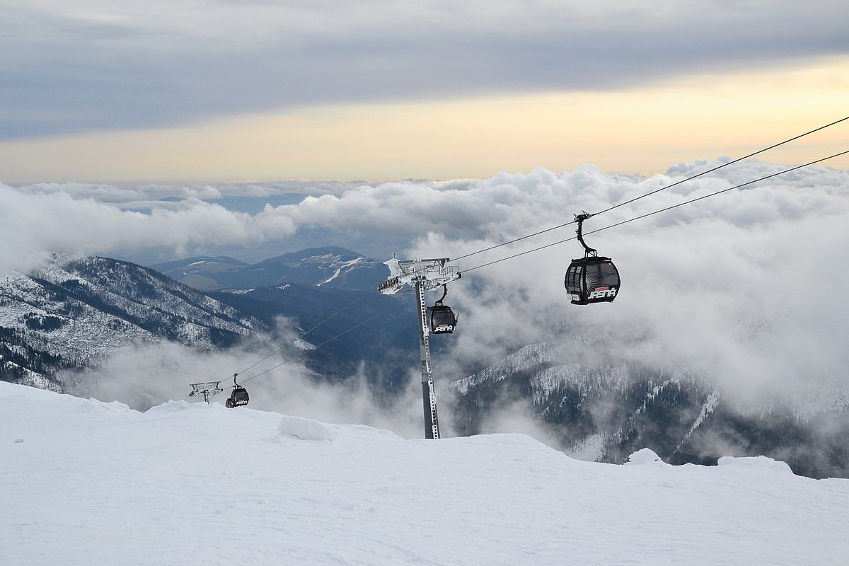 Jasná Nízke Tatry – Chopok in Slovakia - a ski lift going up the mountain.