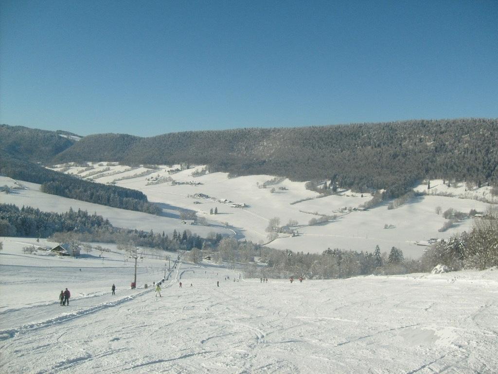 Le Pâquier – Crêt-du-Puy in Switzerland - a clear blue sky.