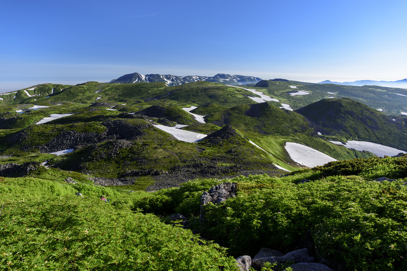 Minami Furano in Japan - a view of the mountains from the top of a mountain.