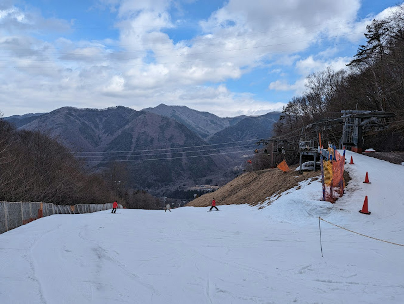 Kamui Misaka in Japan - a ski slope with a ski lift in the background.