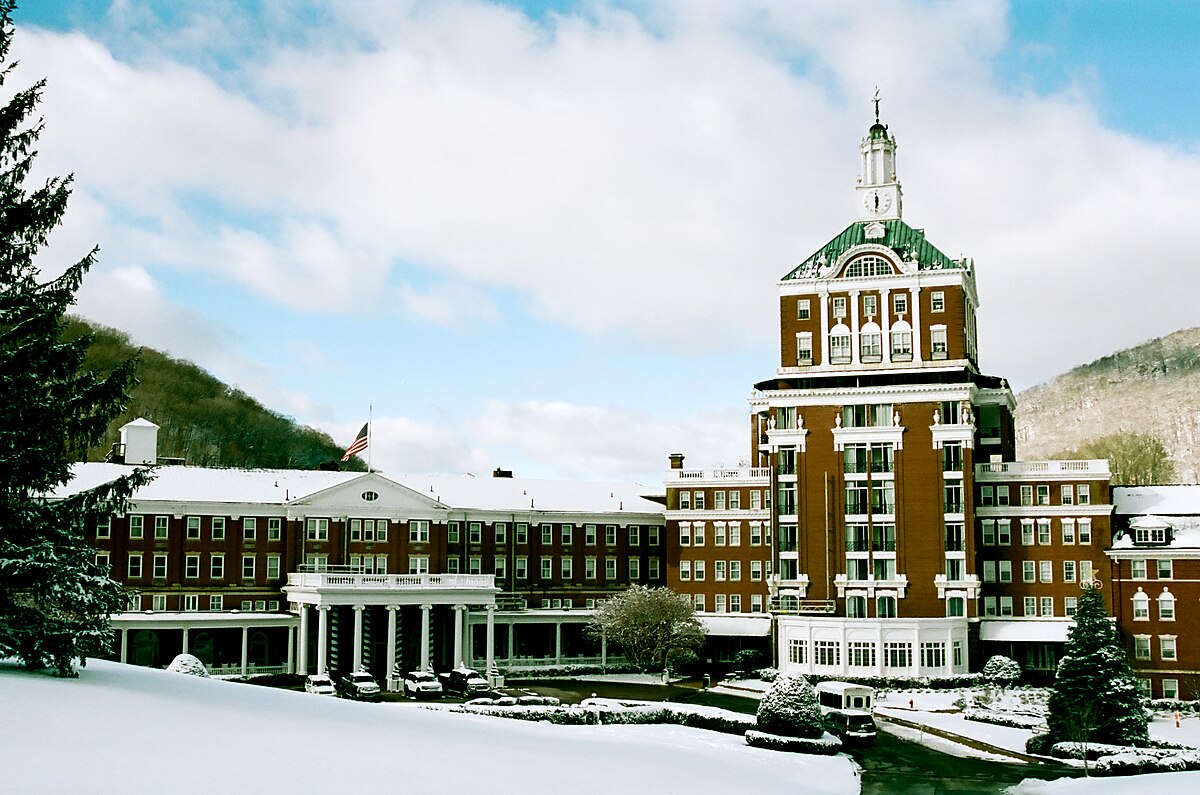 The Homestead Resort in USA: a large red brick building.