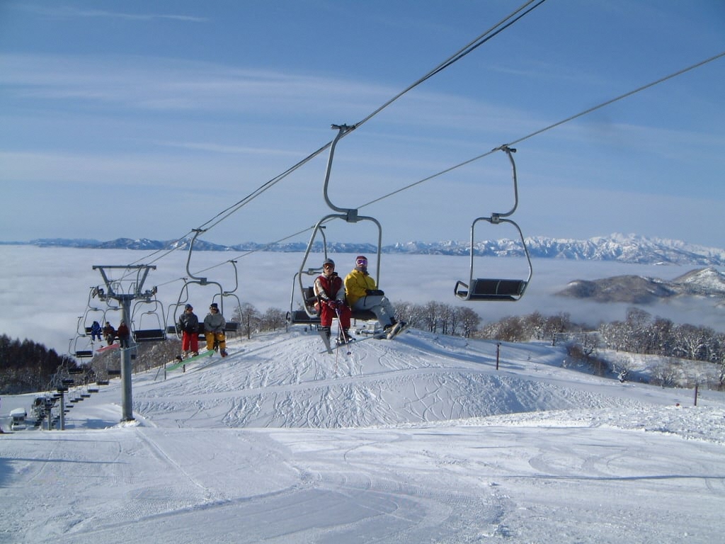 Hirayu Onsen in Japan - a group of people on a ski slope.