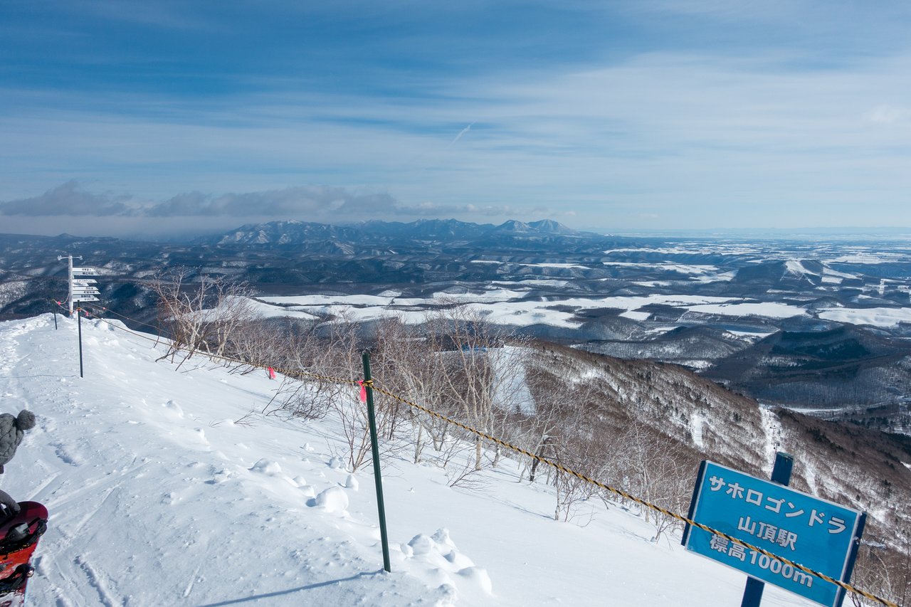 Shintokuyama Ski Area in Japan - a person standing on top of a snow covered mountain.