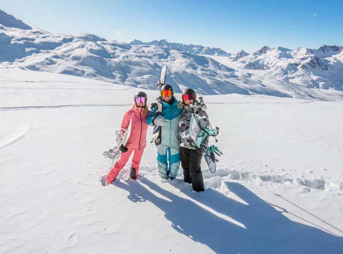 Les Sybelles in France - a group of people standing in the snow.