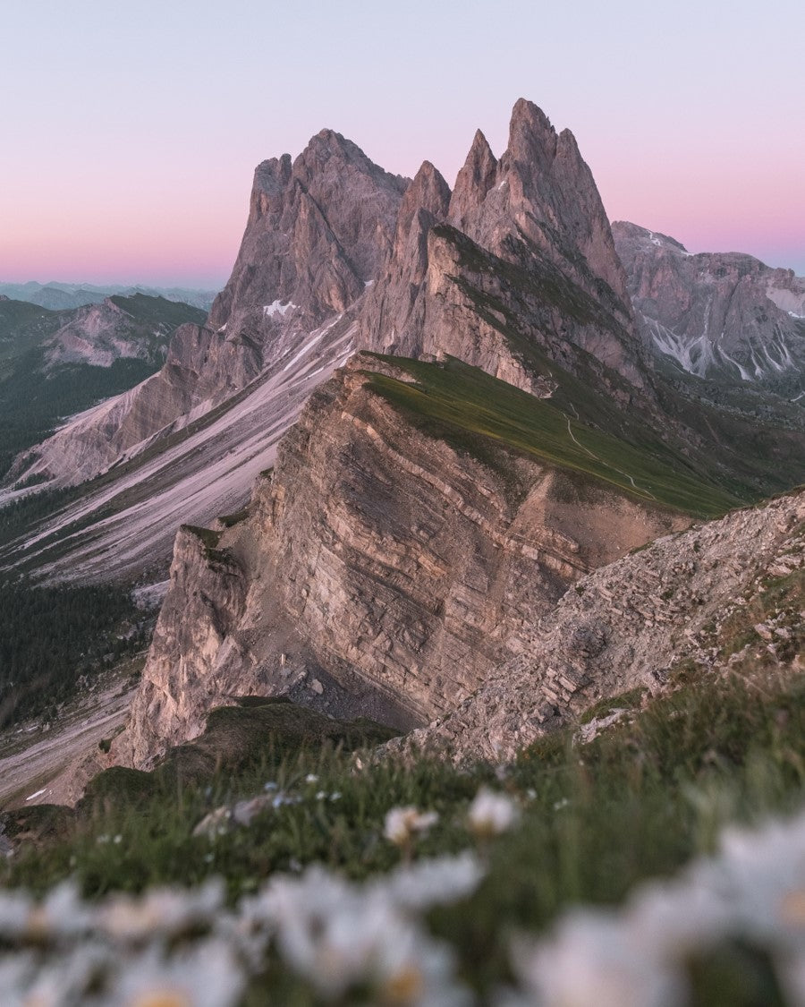 Misurina – Passo Tre Croci in Italy - the mountains are covered in snow and flowers.