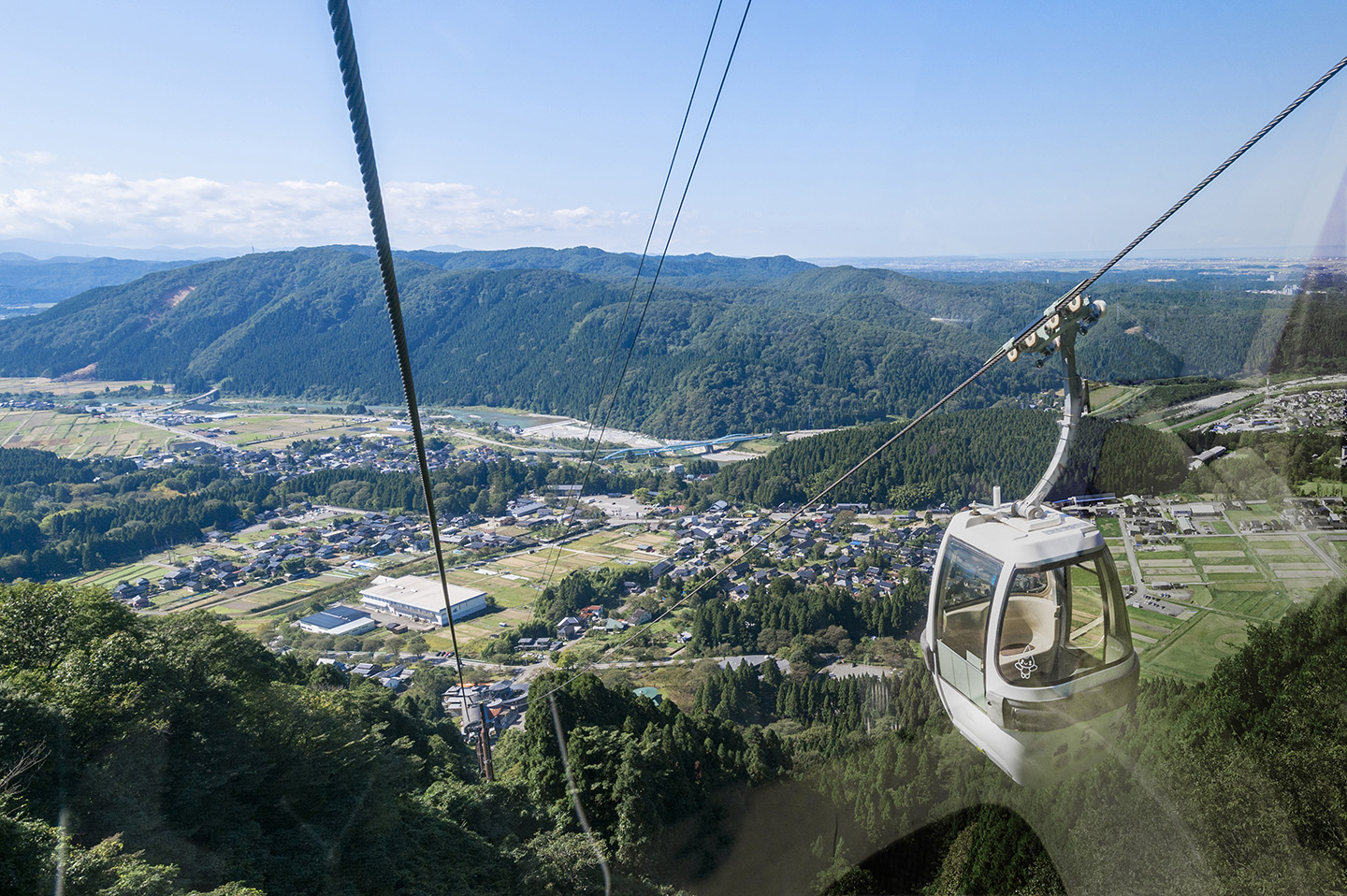 Sky Shishiku in Japan - a view of a city from a cable car.