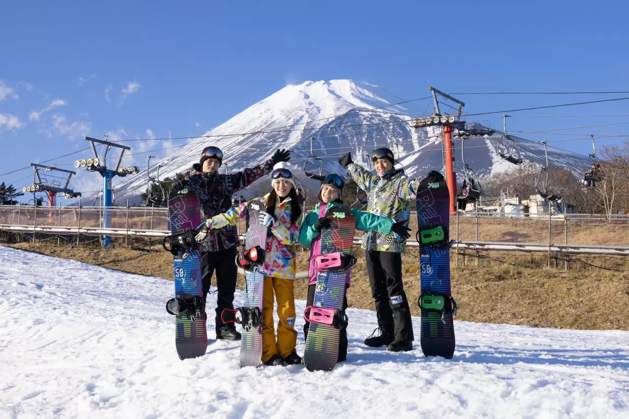 Yeti Resort in Japan - a group of people posing for a picture in the snow.