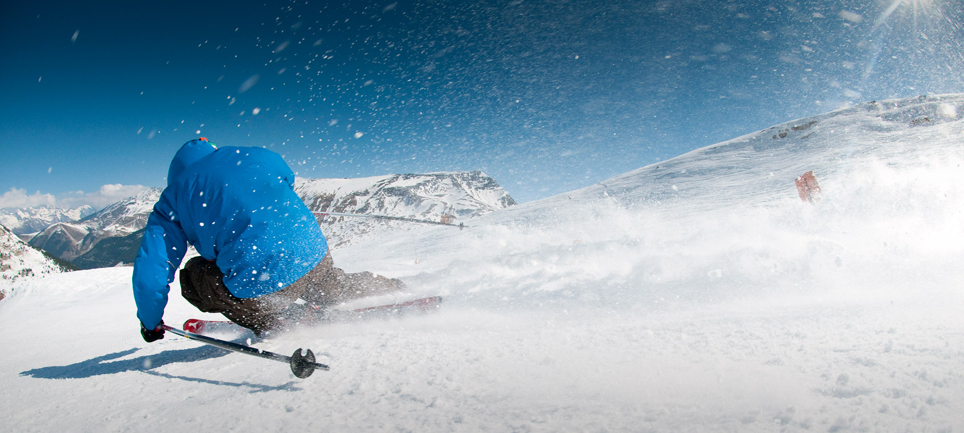 Cerler in Spain - a person on a snowboard in the snow.