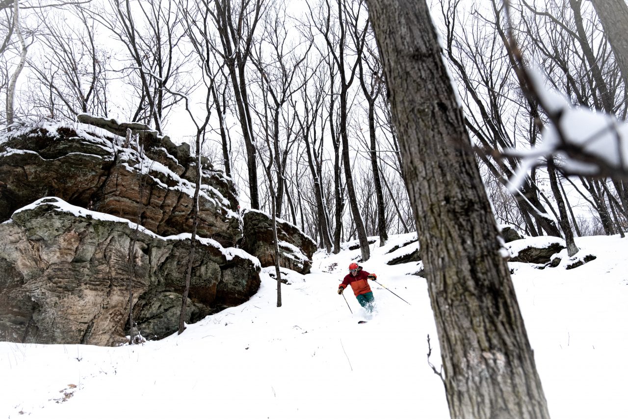 Tyrol Basin – Mt Horeb in USA - a person skiing down a hill in the snow.