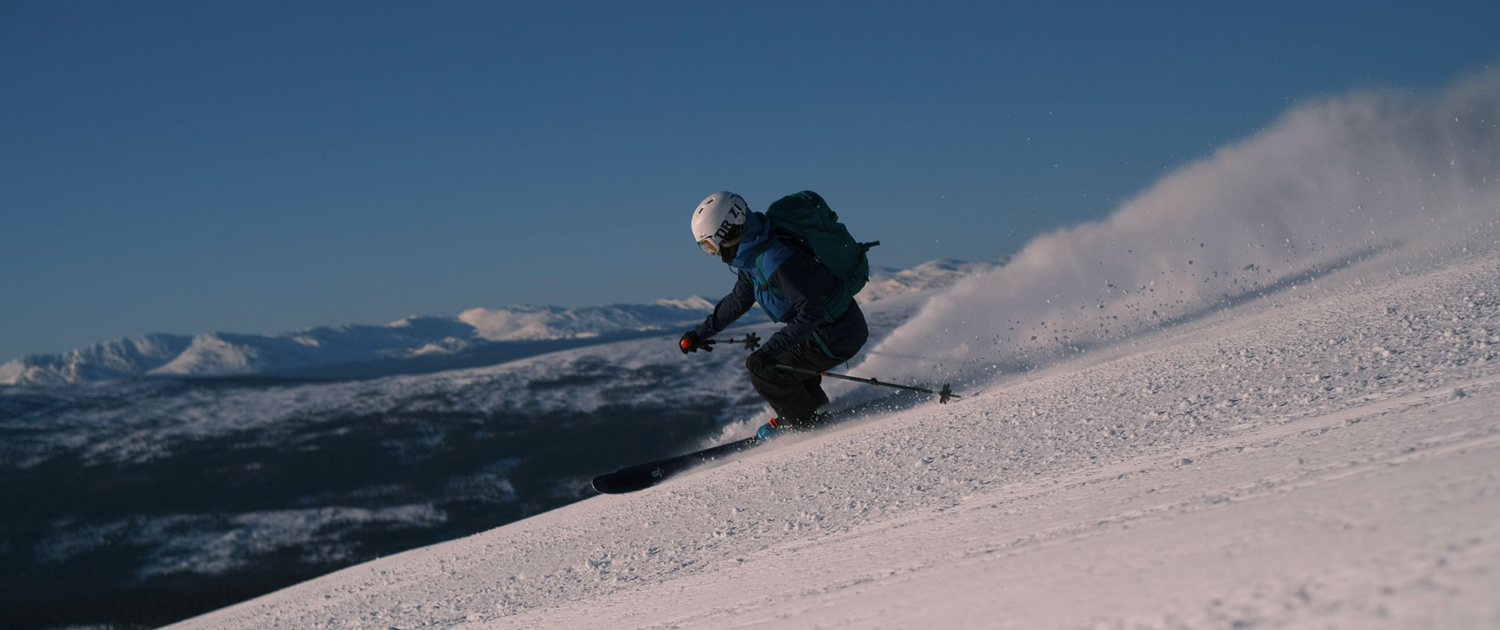 Edsåsdalen in Sweden - a person riding a snowboard down a hill.