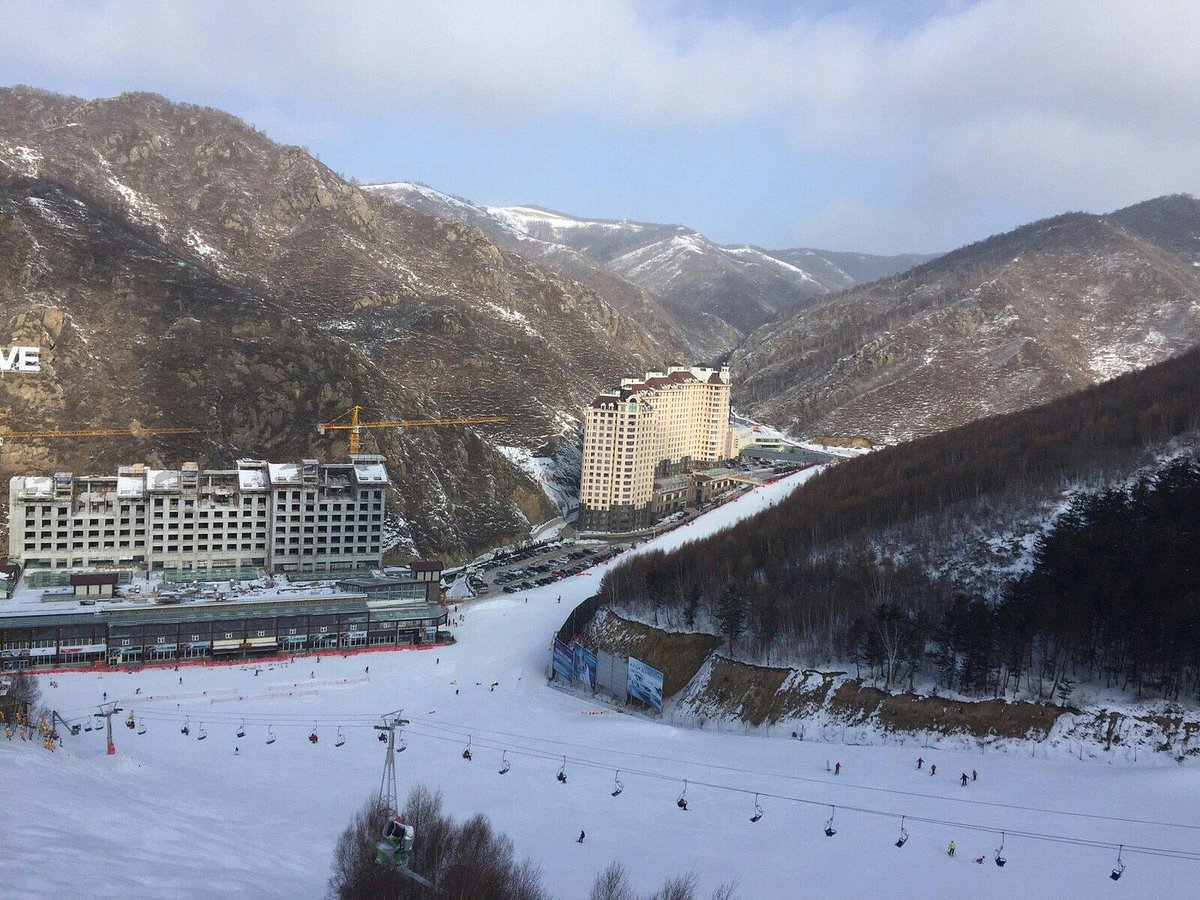 Wanlong Ski Resort in China: a view of a ski resort in the mountains.