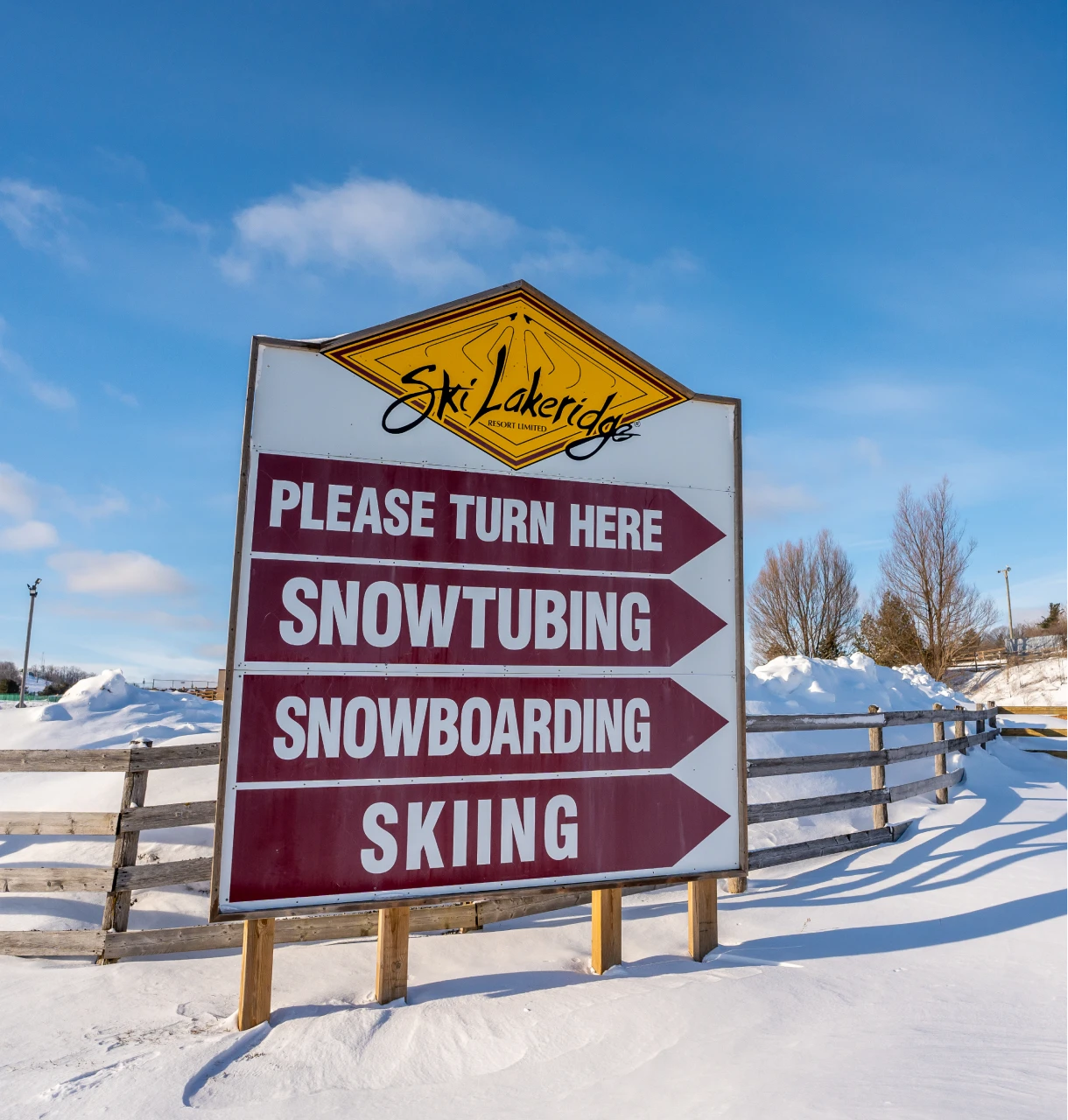 Lakeridge Resort in Canada - a red and white sign sitting in the snow.