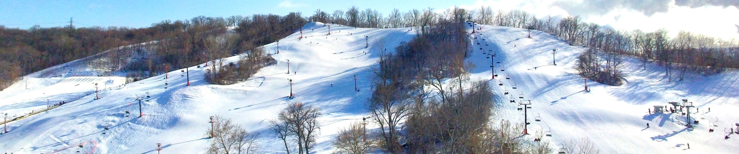 Snow Creek in USA - a group of people skiing down a mountain.
