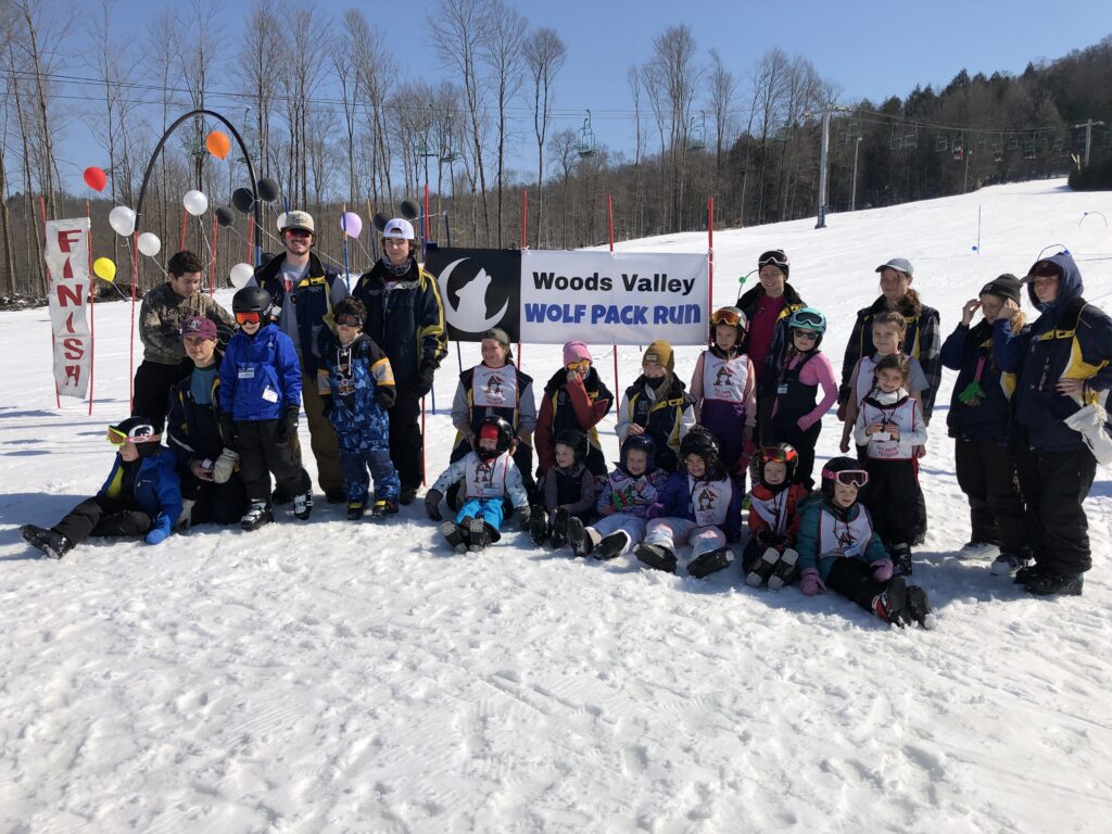 Woods Valley in USA - a group of people posing for a photo in the snow.