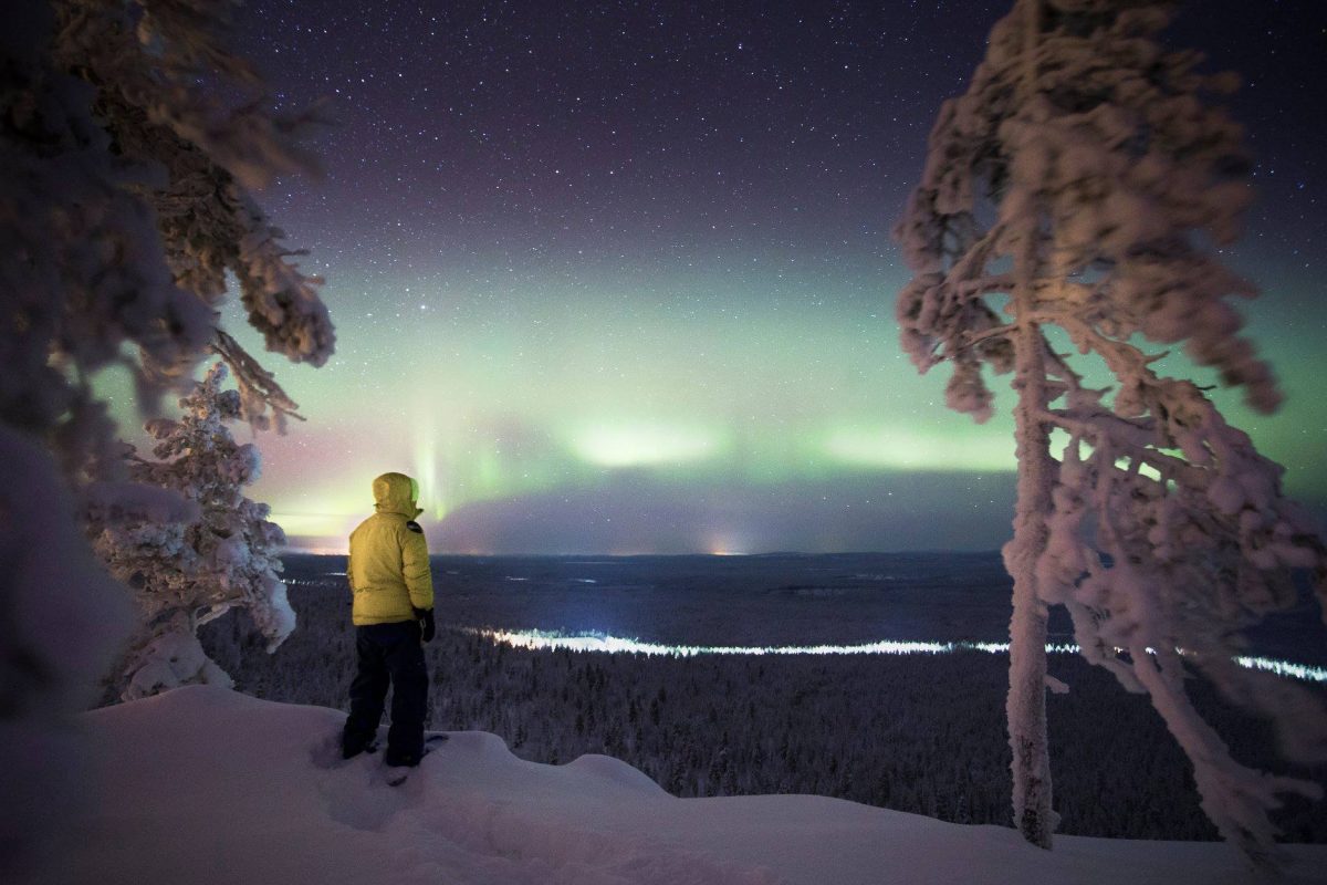 Luosto in Finland - a person looking at the aurora aurora aurora aurora aurora aurora aurora aurora aurora aurora aurora.
