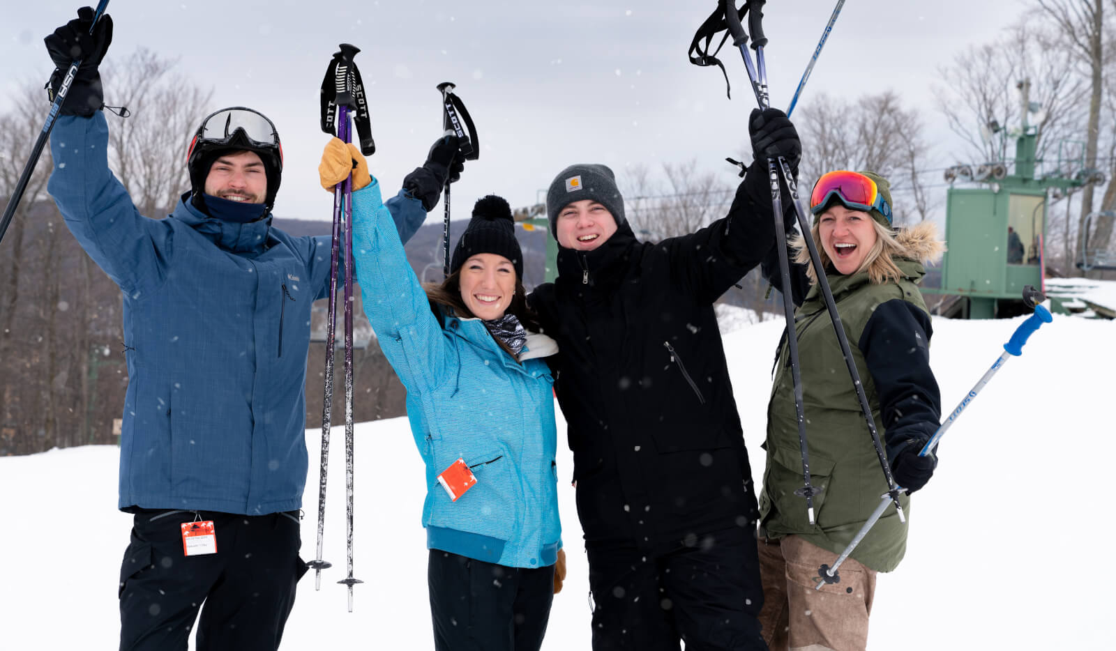 Treetops in USA - three people standing in the snow.