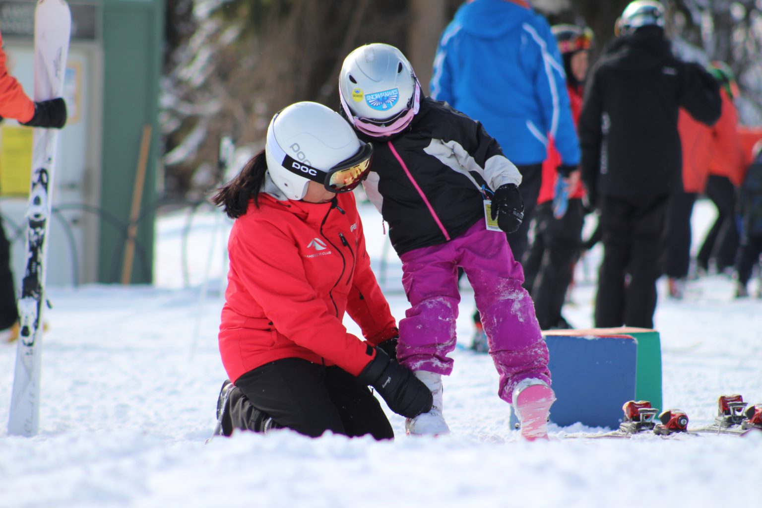 Mansfield Ski Club in Canada - a small child on a snowboard.