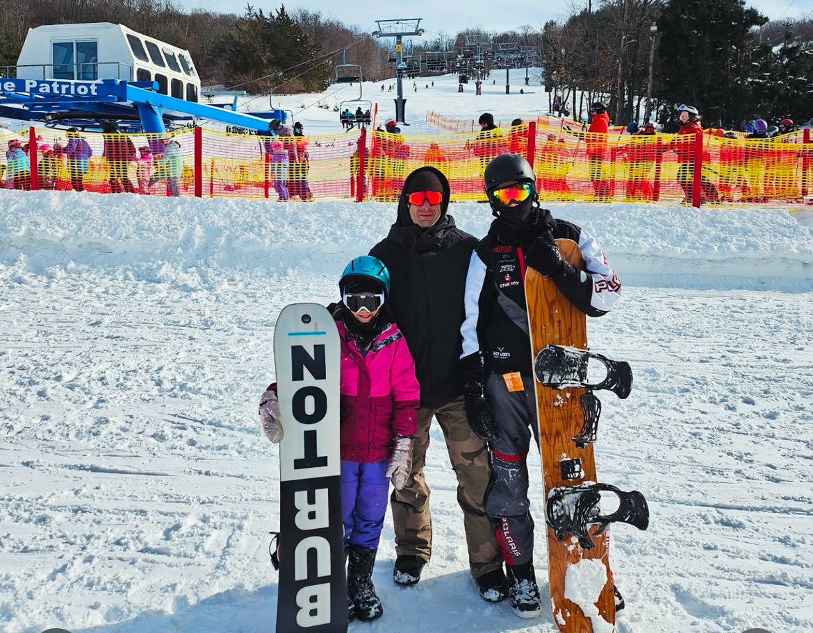 Mount Peter in USA - a group of people posing for a picture in the snow.