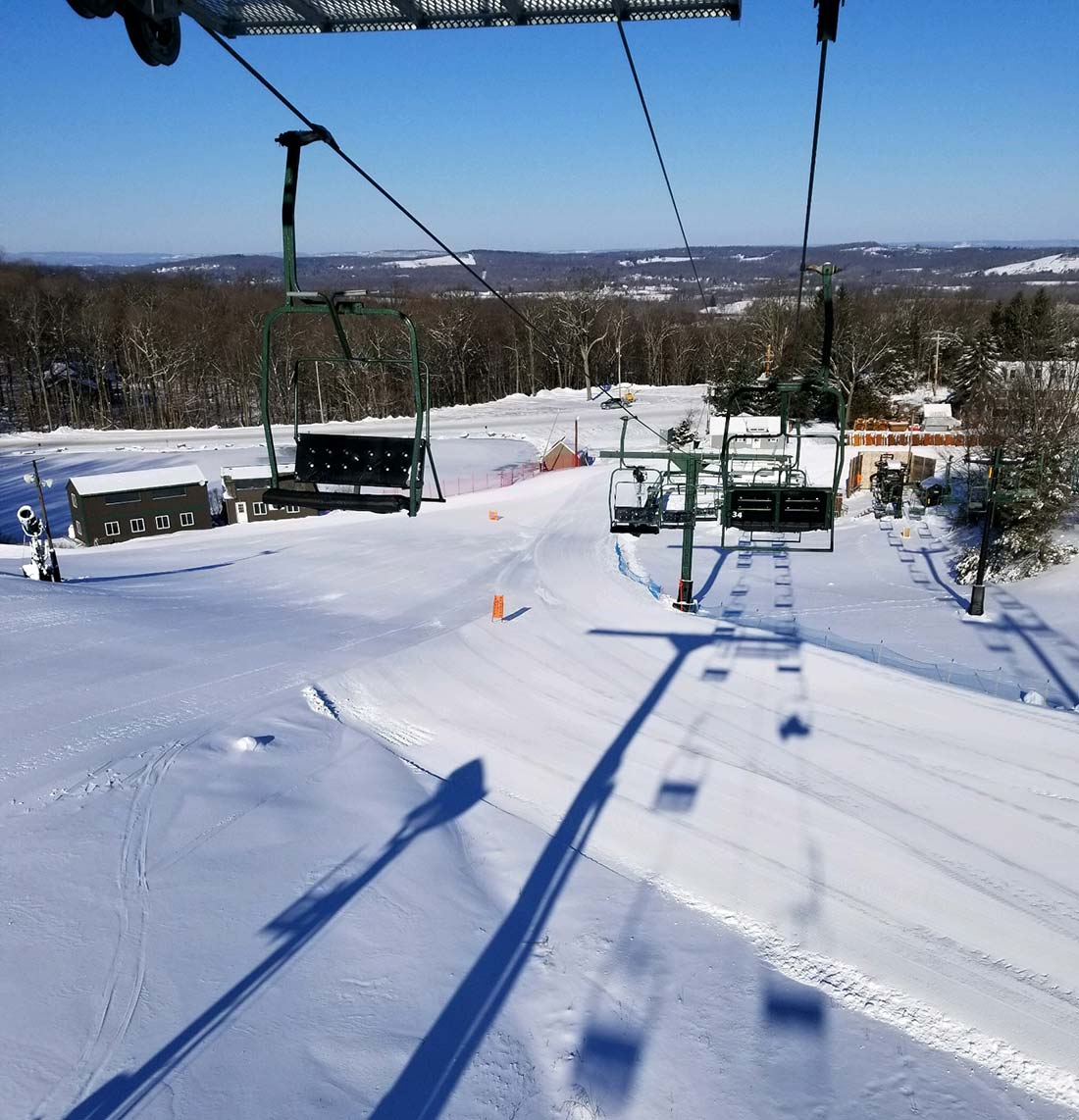 Mount Peter in USA - a ski lift going down a snowy slope.