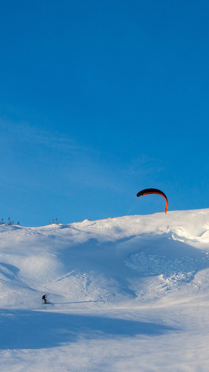 Meråker Alpinsenter in Norway - a person parading down a snowy hill.