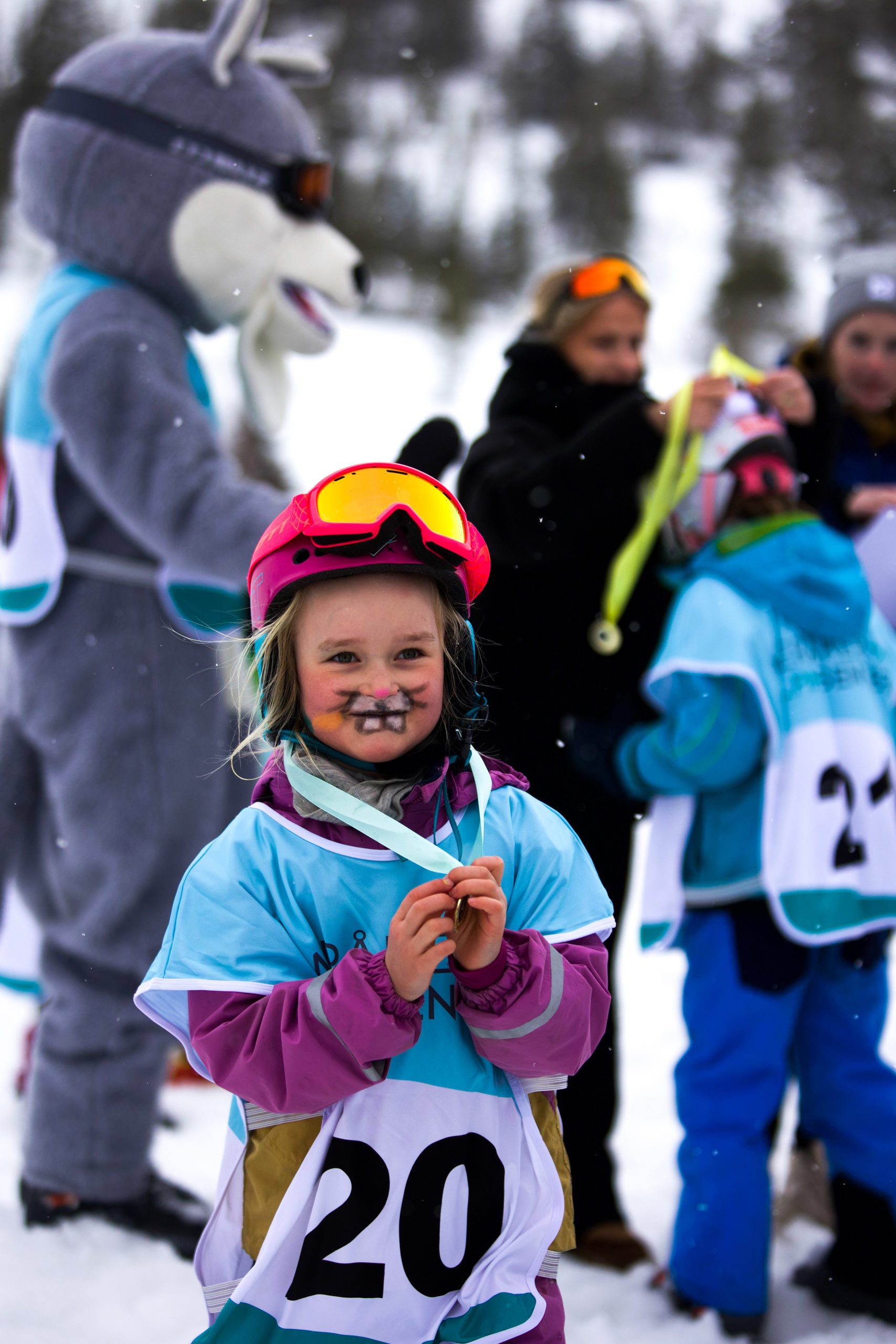 Meråker Alpinsenter in Norway - a little girl is standing in the snow.