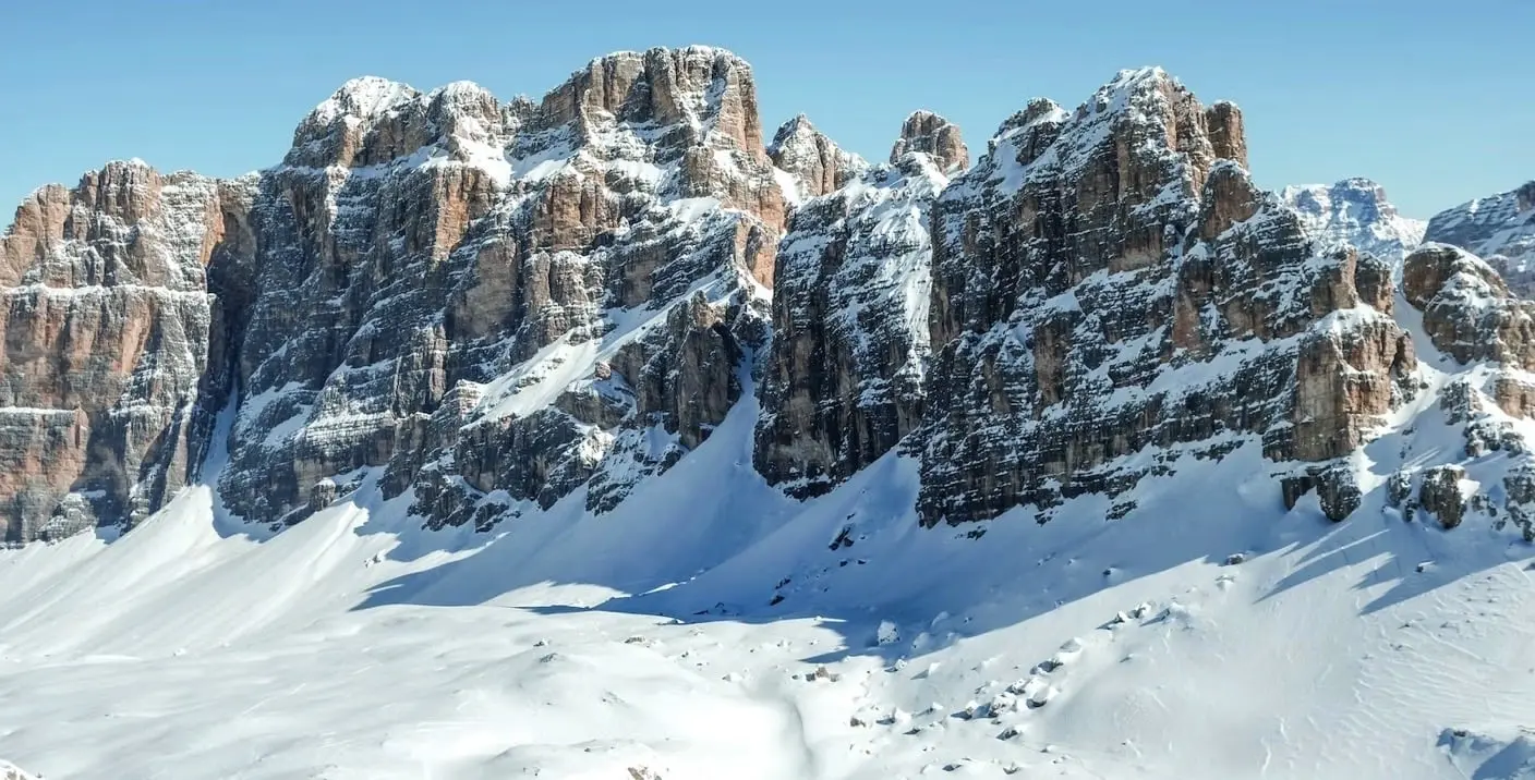 Sellata in Italy - a group of mountains covered in snow.