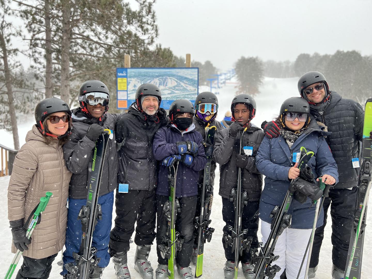 Trollhaugen in USA - a group of people standing in the snow.