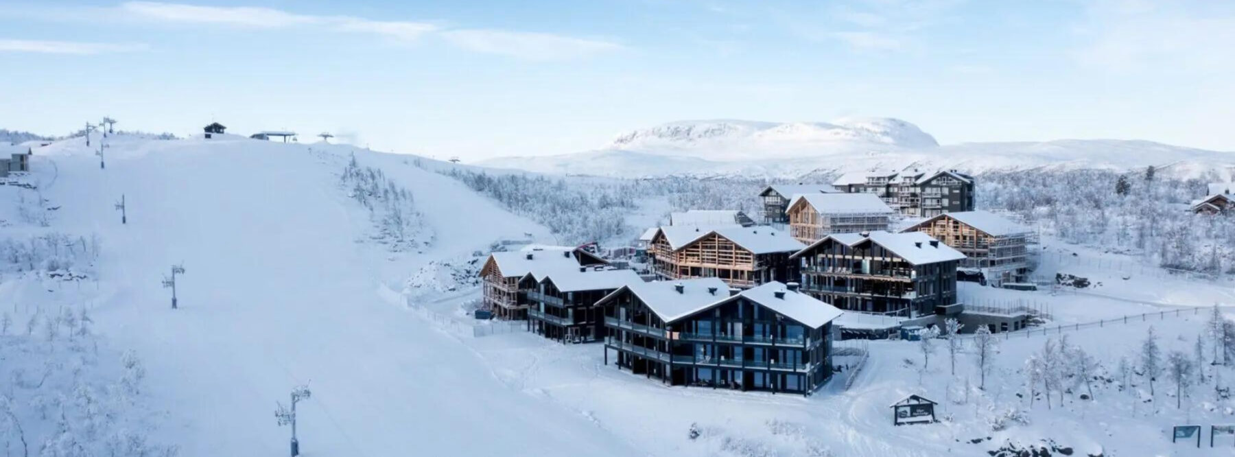 Geilo in Norway: a ski resort surrounded by snow covered trees.