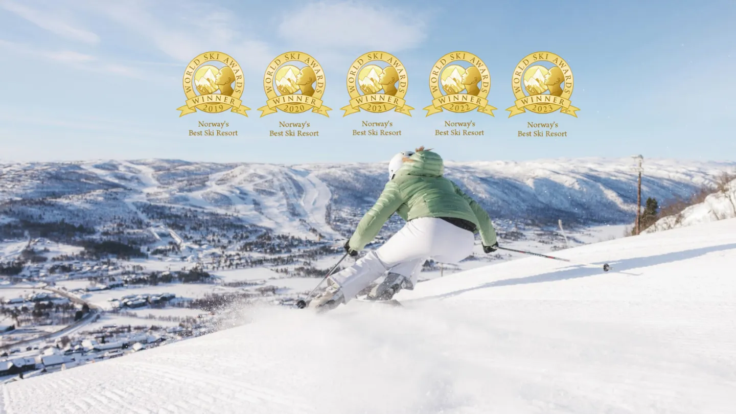 Geilo in Norway - a person skiing down the side of a mountain.