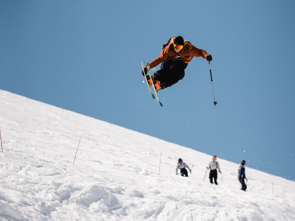 Stryn Sommerski – Tystigbreen in Norway - a man flying through the air while riding skis.