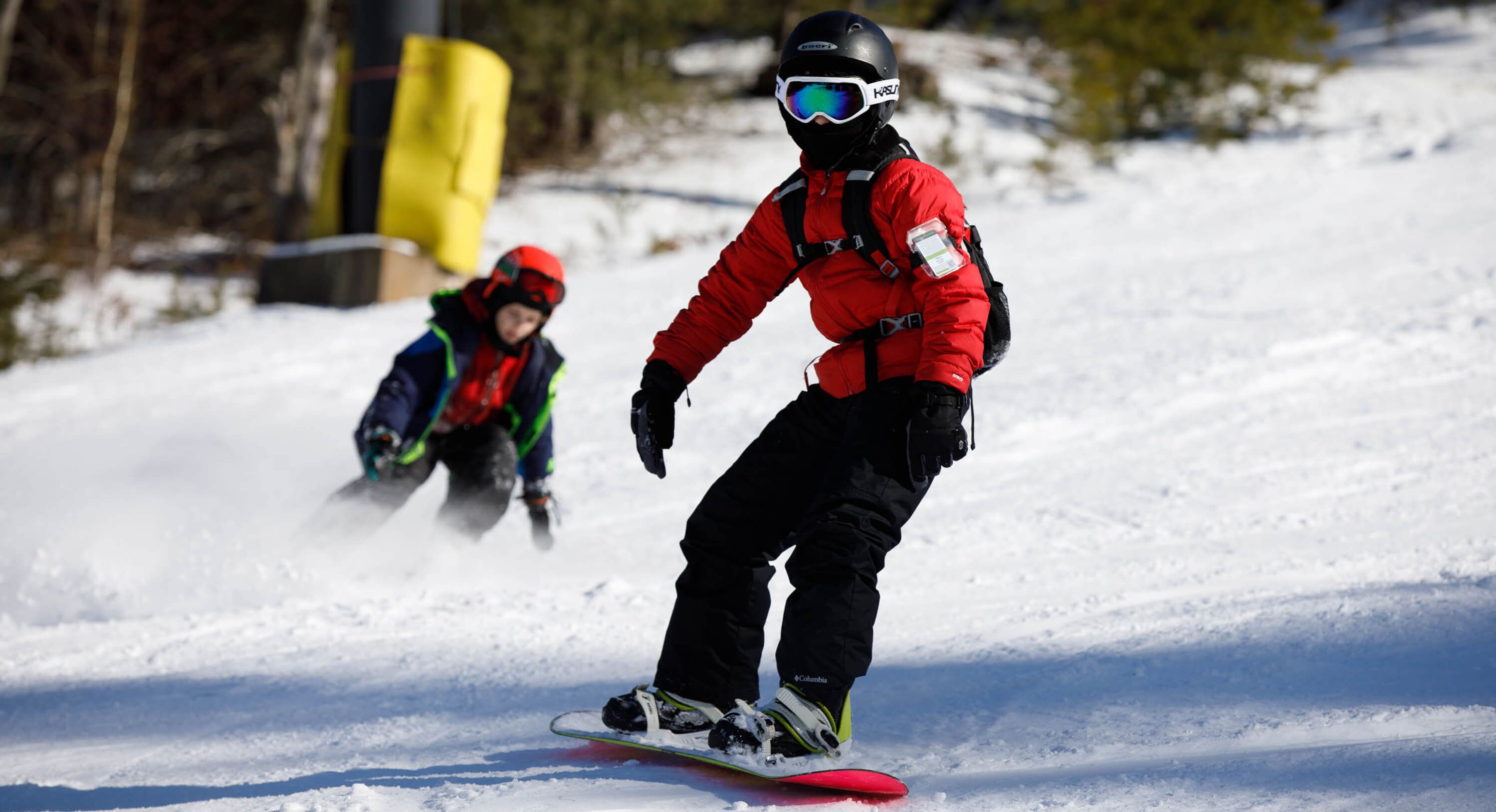 Tussey Mountain in USA - a person on a snowboard in the snow.