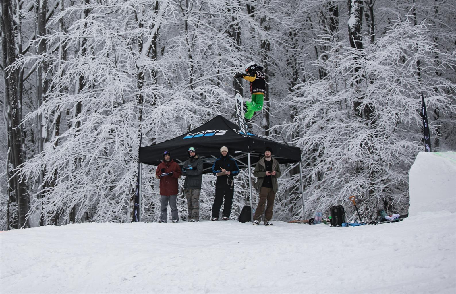 Suior in Romania - a group of people standing on a snow covered hill.