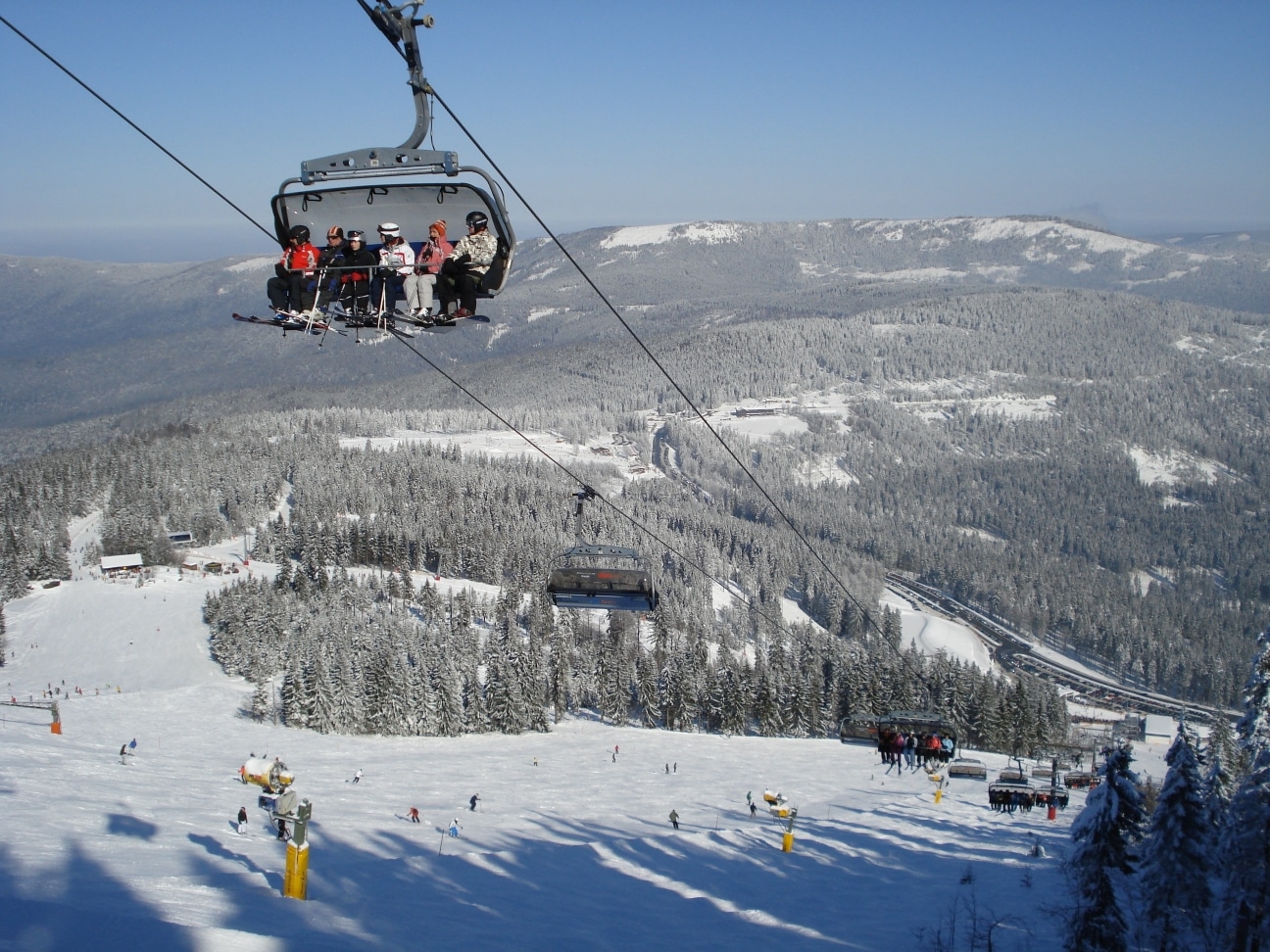 Arber in Germany - a group of people riding a ski lift.