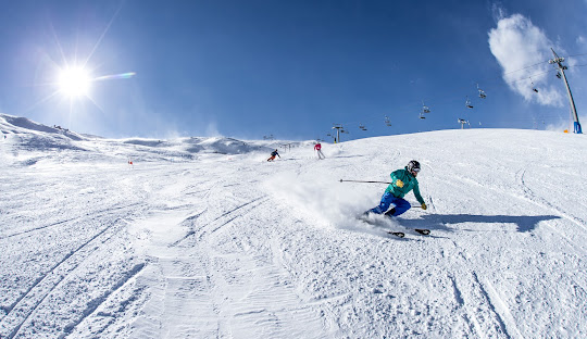Sillian – Thurntaler in Austria - a person skiing down a snow covered mountain.