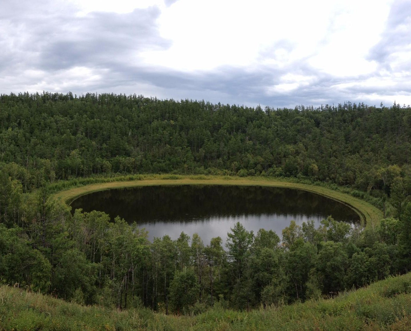 Jinlongshan – Zhalantun in China - a pond in the middle of a forest.