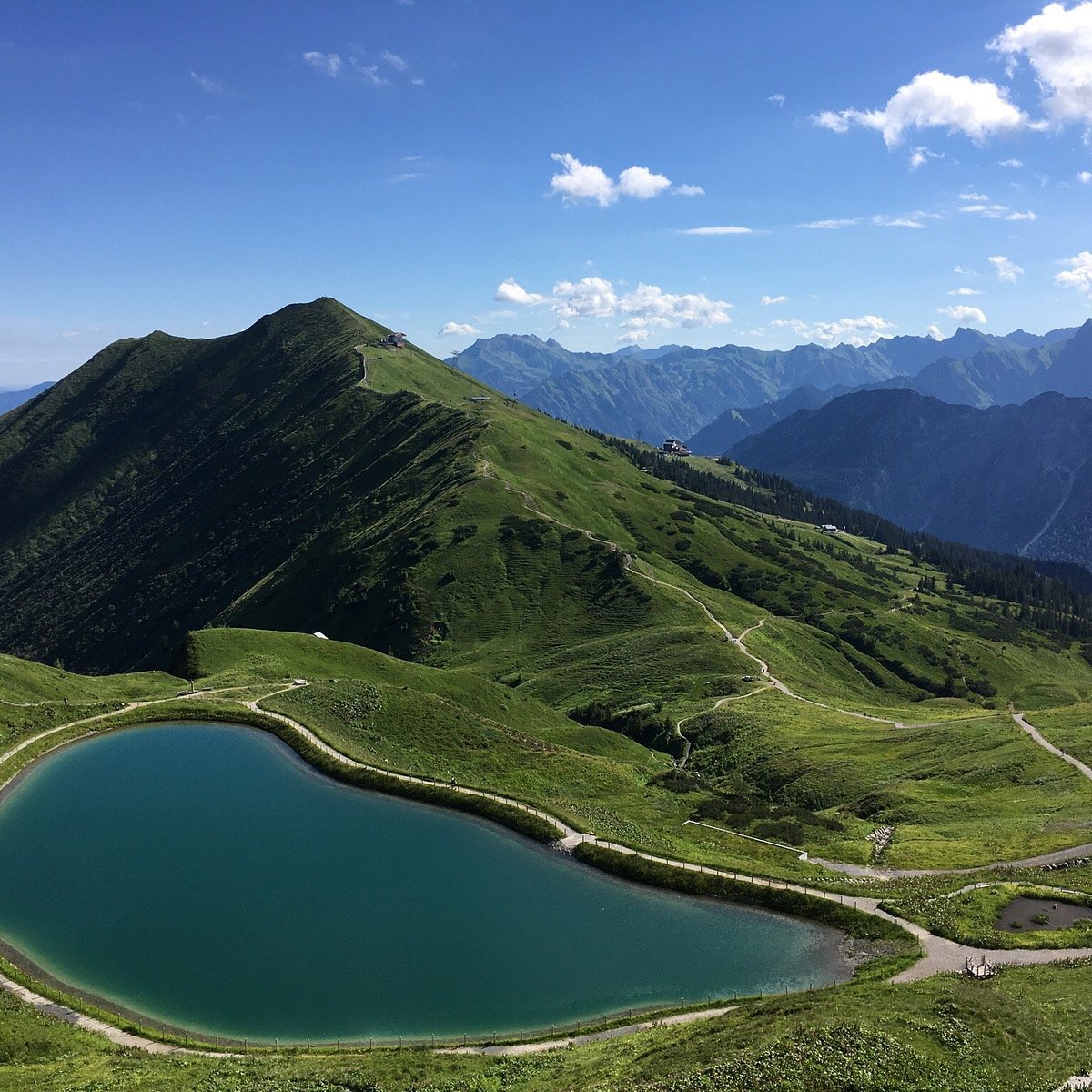 Fellhorn | ​Kanzelwand – Oberstdorf | ​Riezlern in Germany - a lake in the middle of a mountain range.