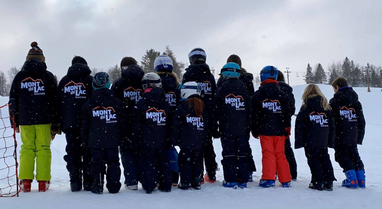Mont du Lac in USA - a group of people standing in the snow.