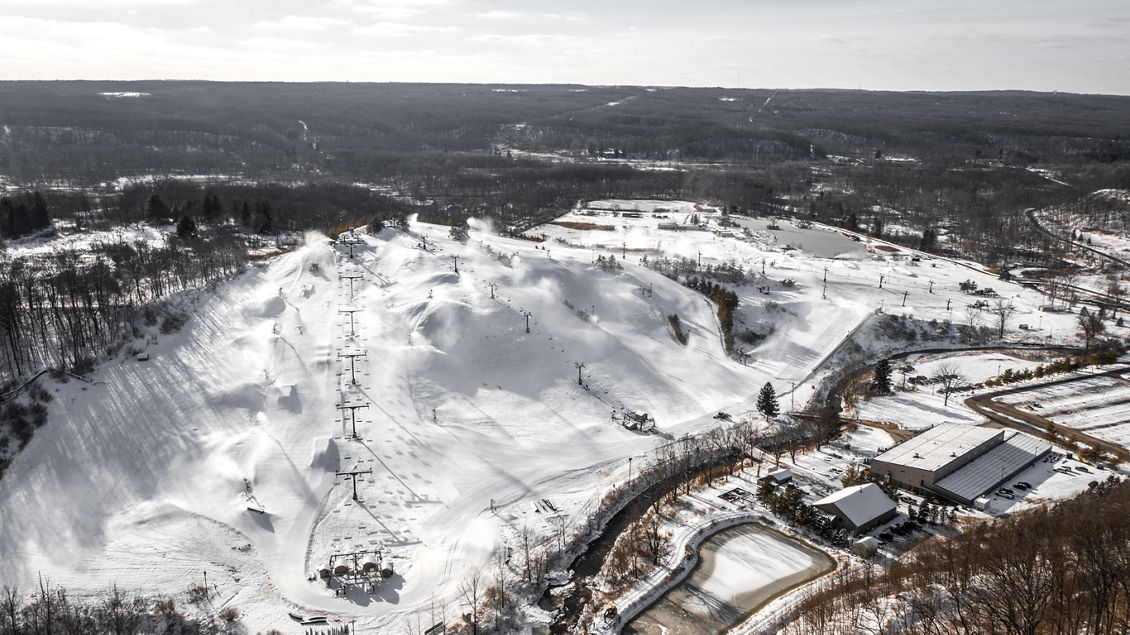 Boston Mills in USA - an aerial view of a snow covered ski area.