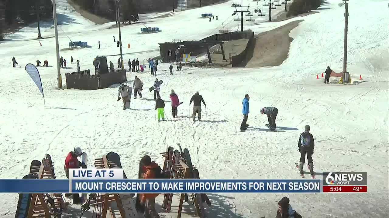 Mt Crescent in USA - a group of people skiing down a snowy slope.